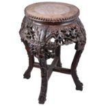 An early 20th century Chinese export rosewood low jardiniere stand