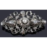 An attractive 18th c Georgian rose cut diamond set cluster scroll brooch