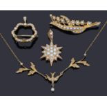 A delicate Continental gold and seed pearl set swallow necklace