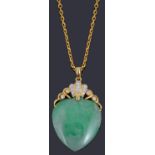 A Continental jade and diamond heart pendant on chain
