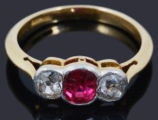 A Victorian ruby and diamond set three stone ring