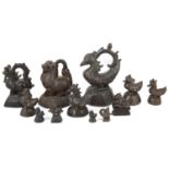 A collection of Burmese bronze zoomorphic spice / opium weights