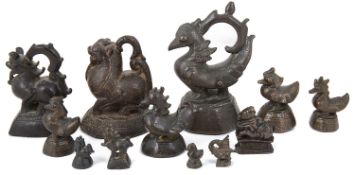 A collection of Burmese bronze zoomorphic spice / opium weights