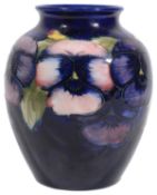 A Moorcroft pottery 'Pansy' pattern vase c.1930