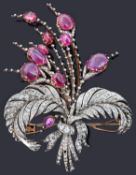 A large 19th c diamond aigrette natural ruby and diamond set spray brooch of tied bouquet form
