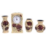 Moorcroft pottery 'Chocolate cosmos' pattern mantel clock; others