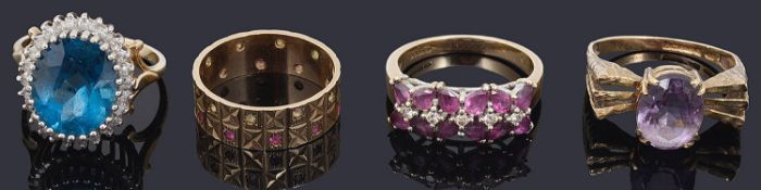 Four gold mounted gem set dress rings