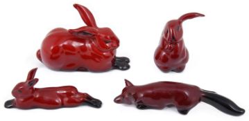 Four Royal Doulton flambé animals