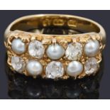 An attractive Victorian pearl and diamond set panel ring