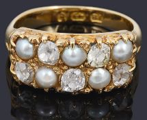 An attractive Victorian pearl and diamond set panel ring