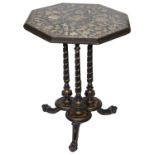 A Victorian ebonised and gilt decoupage decorated occasional table