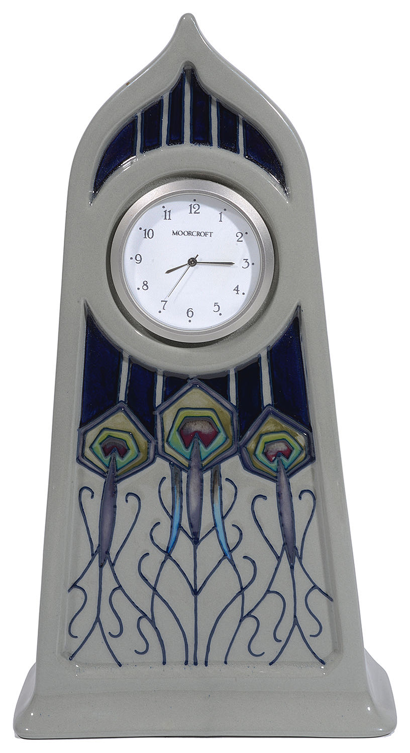 A modern Moorcroft pottery 'Peacock Parade' pattern mantel clock designed by Nicola Slaney