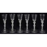 A set of six Georgian style double knopped air twist stem cordial glasses