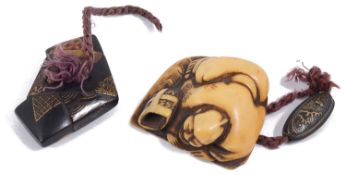 A 19th century Japanese carved ivory netsuke and a wooden toggle