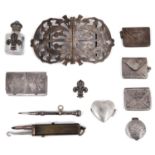 An Edwardian silver nurses buckle, silver stamp envelopes; others