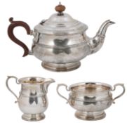 A George V silver three piece tea service