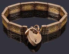 A fancy link 9ct gold gate bracelet