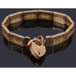 A fancy link 9ct gold gate bracelet