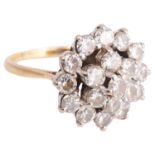 A large Continental diamond set circular cluster dress ring