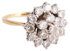 A large Continental diamond set circular cluster dress ring