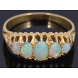 An attractive antique 18ct gold set five stone opal set ring