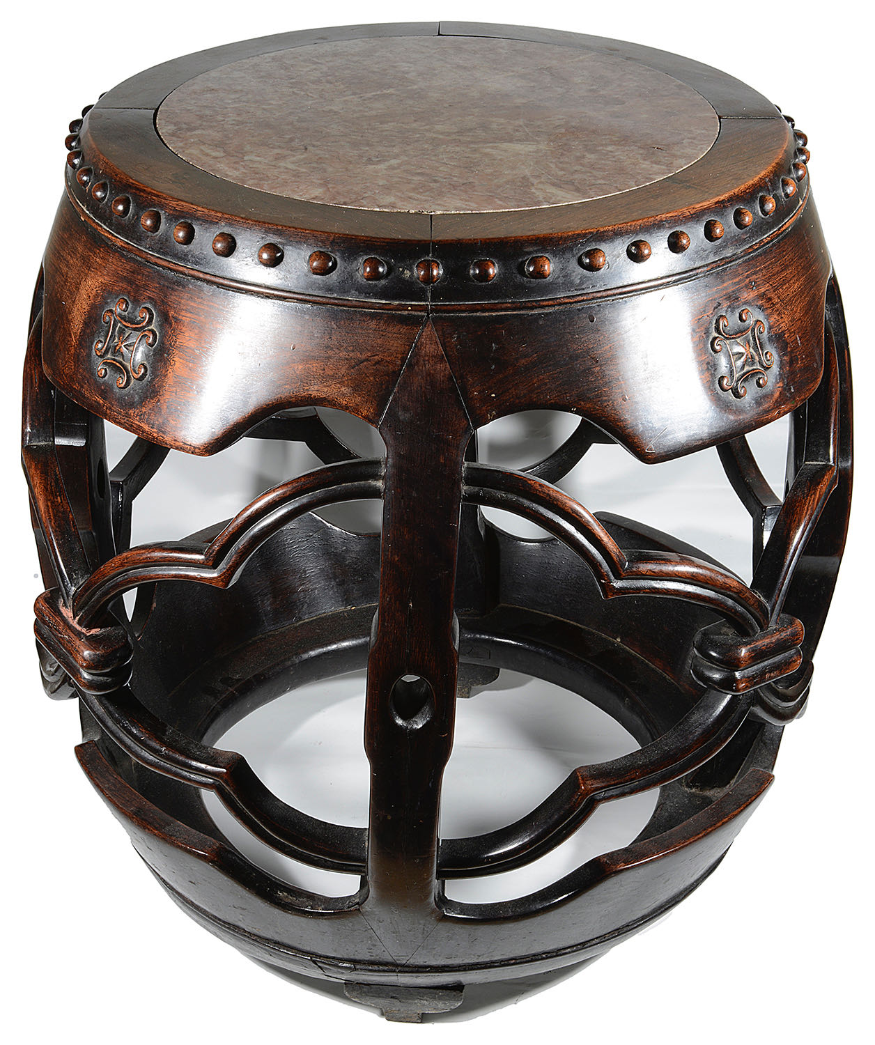 A late 19th century Chinese carved hardwood barrel shaped stand