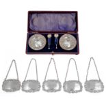 A set of five modern silver bottle tickets and a cased pair of late Vict. silver salts