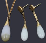 A hardstone drop pendant on chain together with a pair of jade earrings