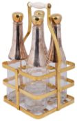 An early 20th c French novelty electroplated and gilt four bottle liqueur set