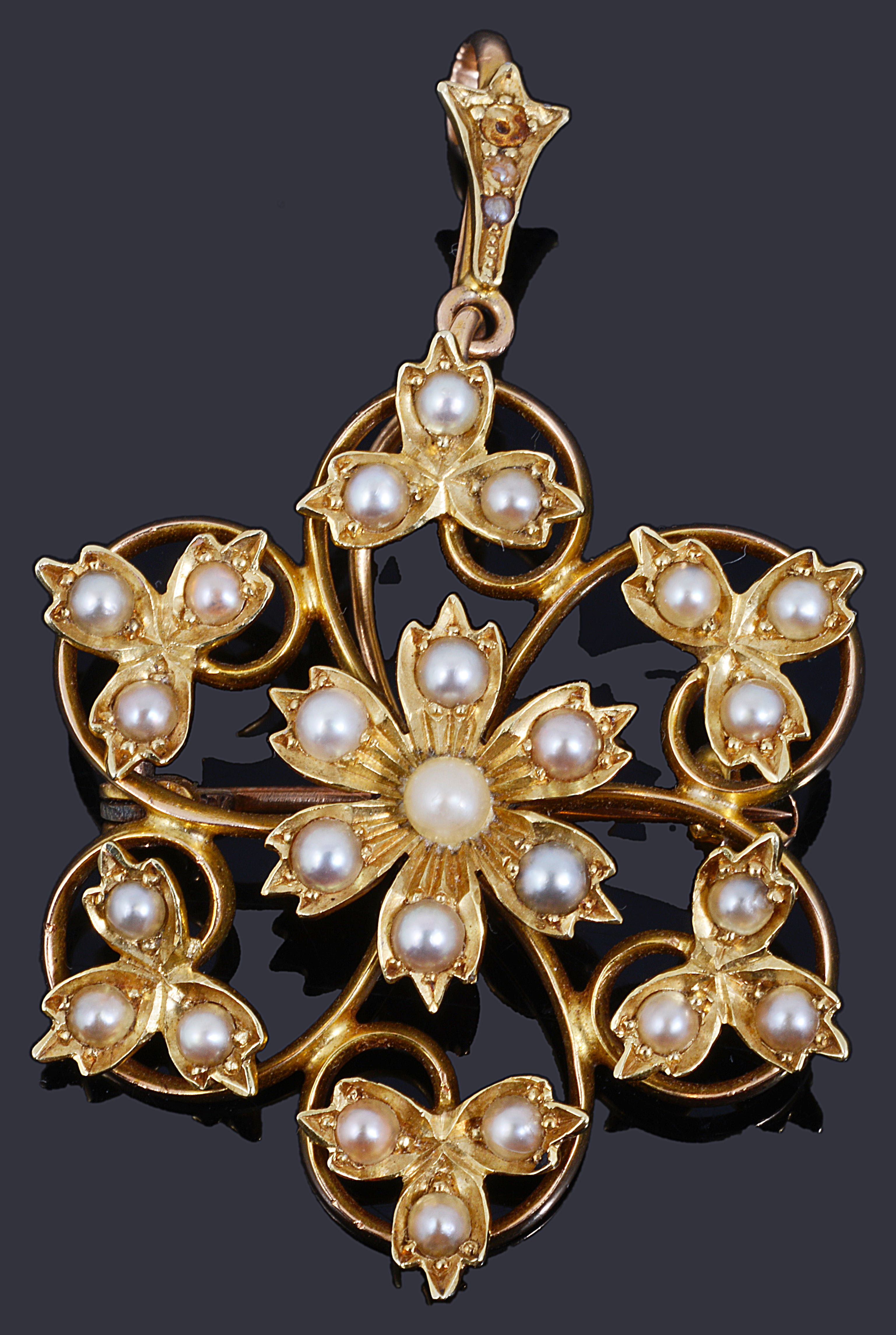 A delicate Edwardian 15ct gold and seed pearl pendant brooch