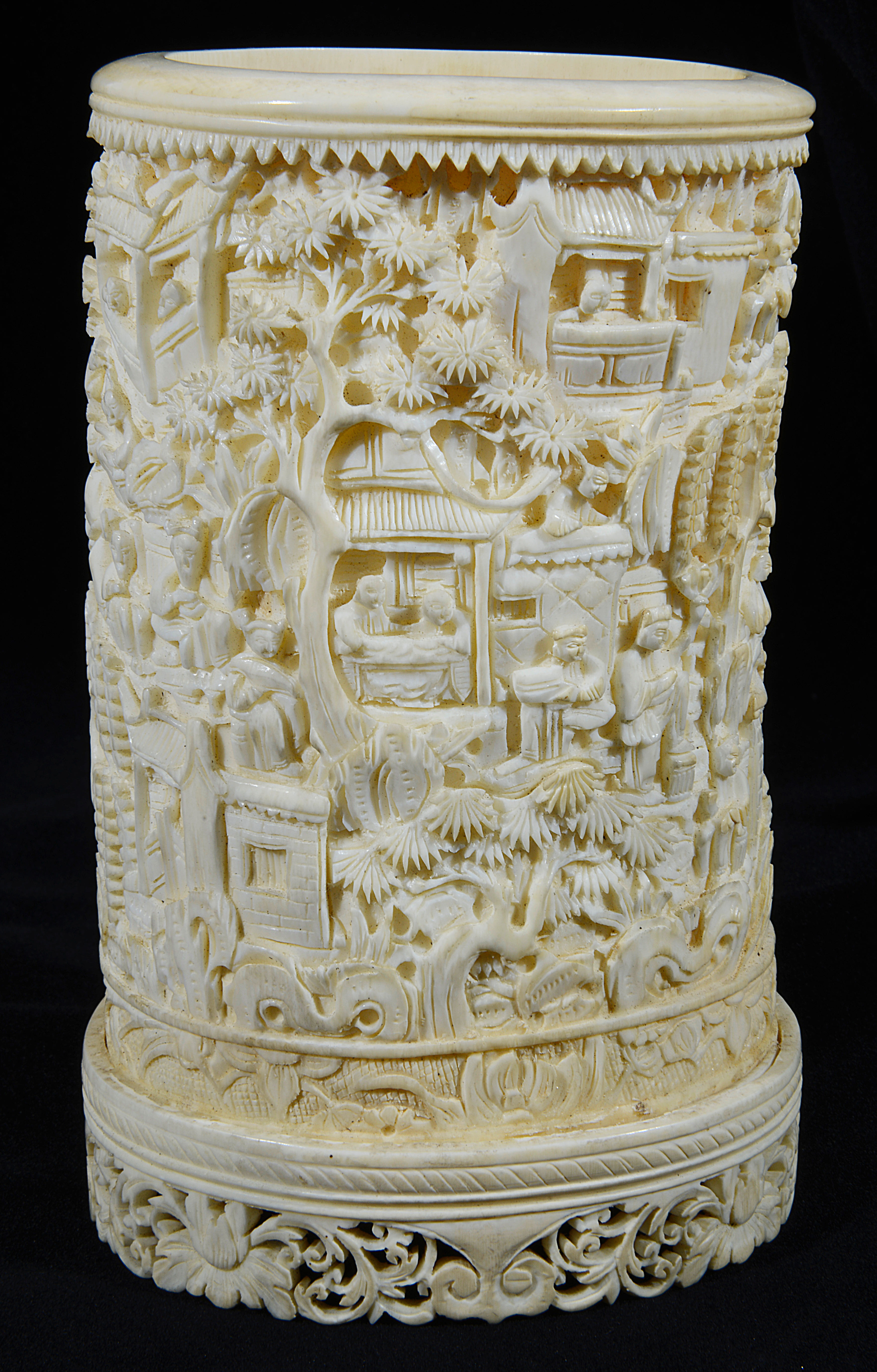 A late 19th century/early 20th c Chinese Canton carved ivory tusk vase