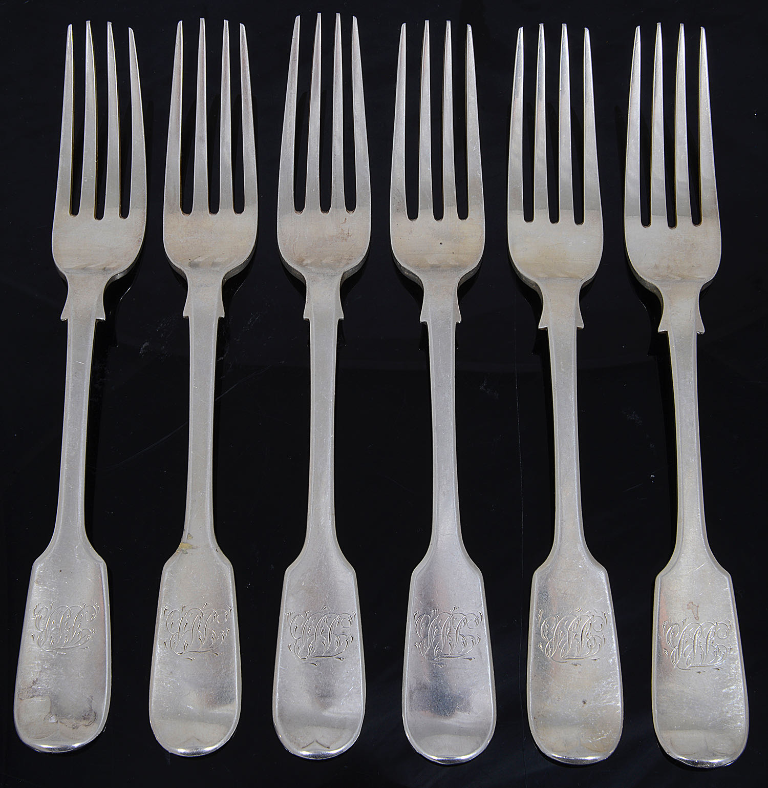 A matched set of six William IV and early Vict. fiddle pattern table forks