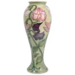 A modern Moorcroft Collectors Club 'Sweet Pea' pattern vase designed by Sally Tuffin