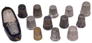 A collection of silver and silver plate thimbles