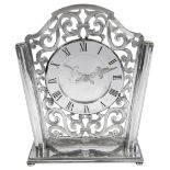 A modern silver Asprey mantle clock