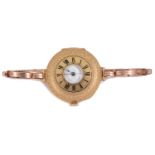 An 18k Swiss gold ladies half hunter wristwatch