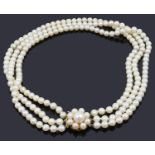 A three row cultured pearl choker necklace
