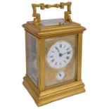 A late 19th century French ormolu repeating carriage clock