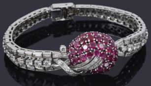 A good quality ruby and diamond set articulated cocktail bracelet, circa 1950