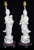 A pair of Chinese blanc de chine figures modelled as Guanyin