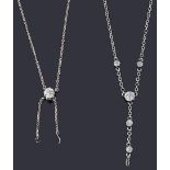 Two diamond set part necklaces
