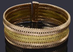 A Continental heavy fully articulated two colour strap bracelet