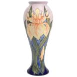 A modern Moorcroft pottery 'Windrush (Yellow Iris)' pattern vase designed by Debbie Hancock