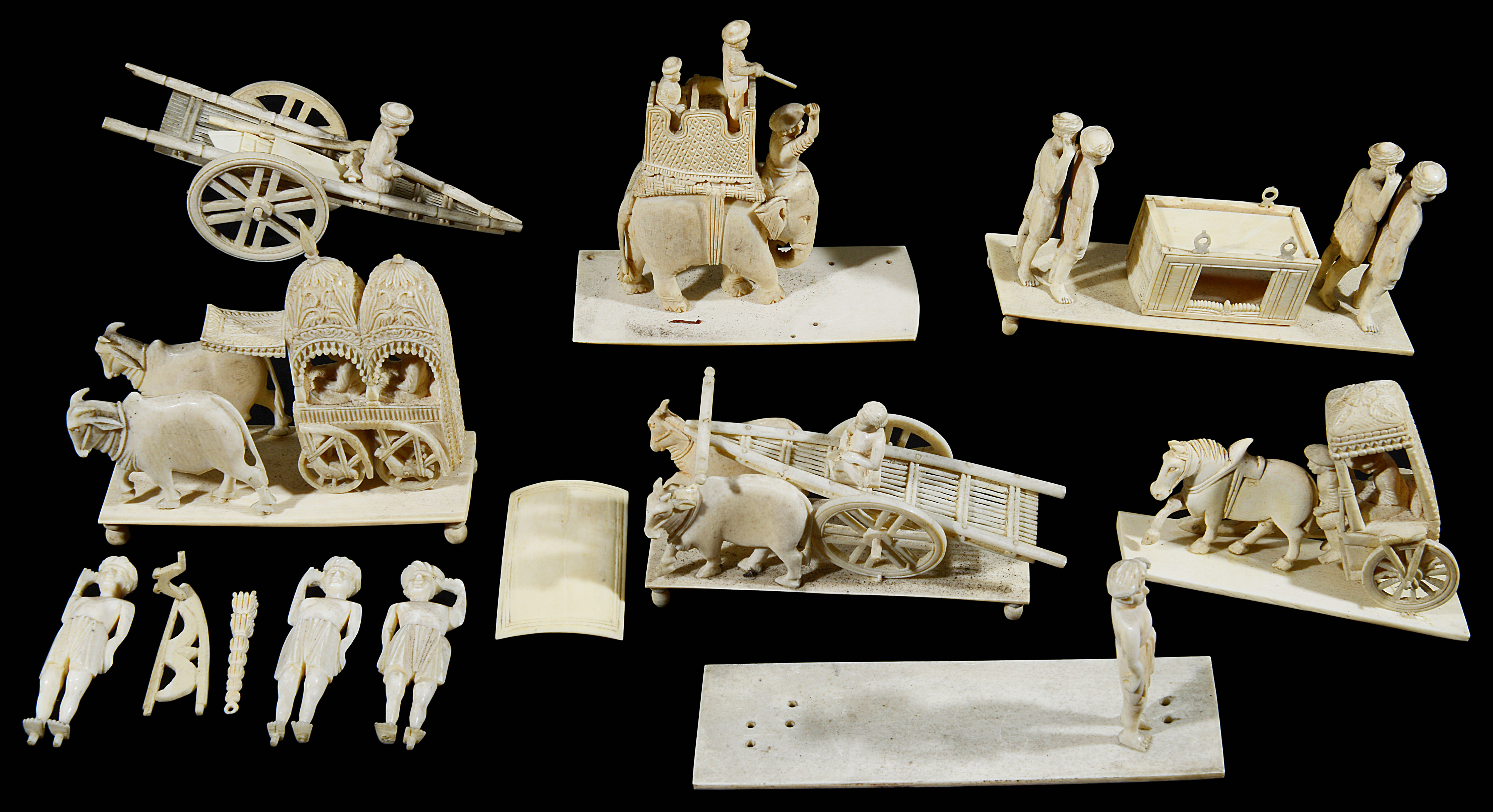 A collection of 19th century Indian carved ivory groups