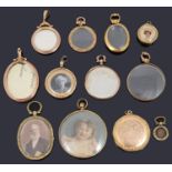A collection of Victorian and later gold picture lockets