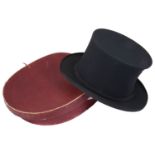 An early 20th c gentleman's collapsible black silk opera hat by Tress & Co.