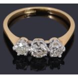 A three stone diamond set ring