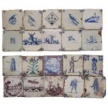 A collection of twenty Dutch Delft blue and white tiles