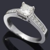 A good quality princess cut diamond set ring