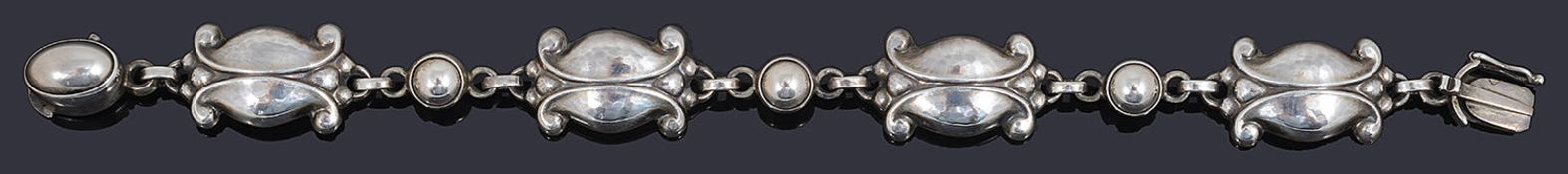 An attractive Georg Jensen sterling silver scroll panel bracelet
